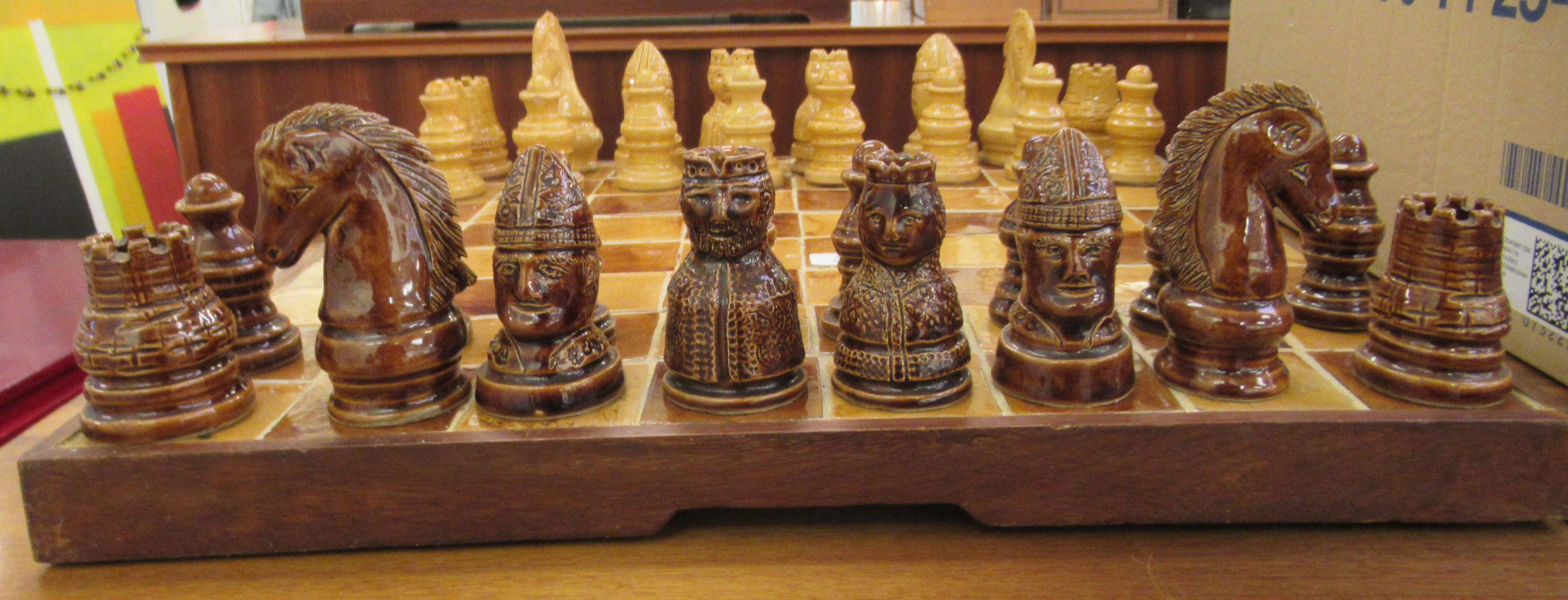 A modern ceramic, two tone tiled chessboard  20''sq with hollow pottery pieces  the kings 3.25''h - Image 2 of 2