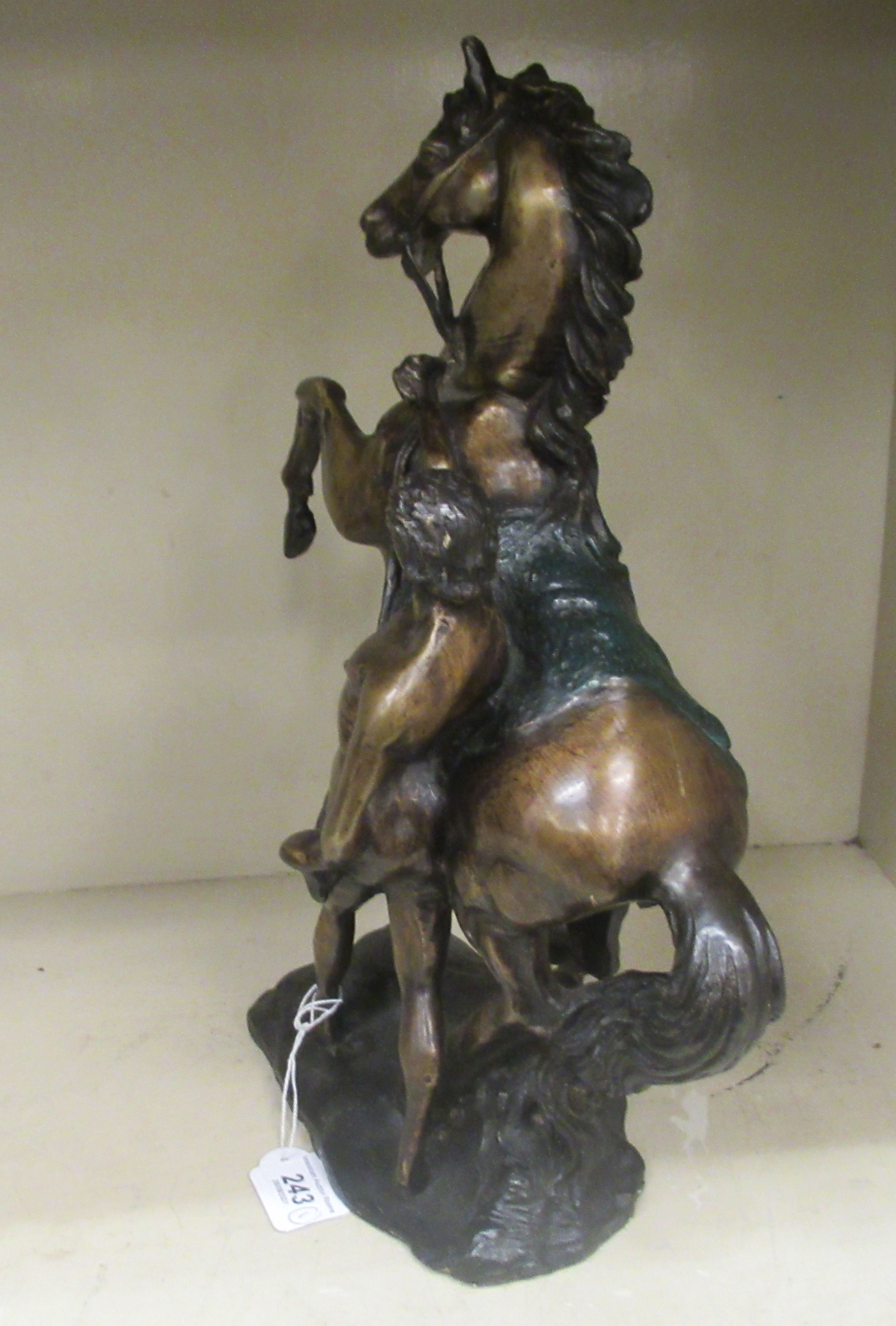 A modern cast bronze Marli inspired sculpture, a man tending to a rearing horse, on a plinth  16"h - Image 2 of 3
