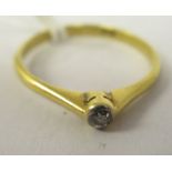 An 18ct gold single stone diamond ring