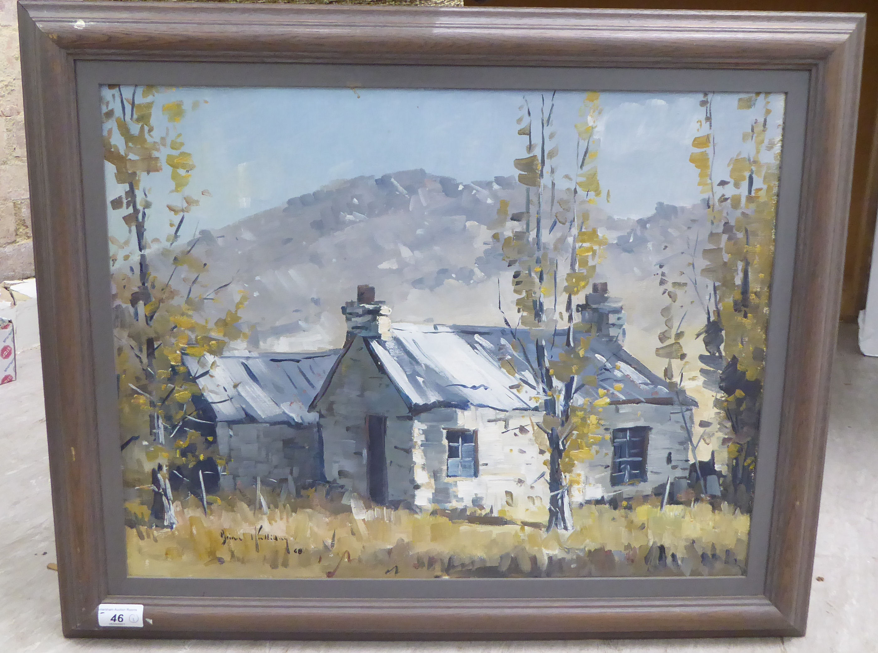 Brian Halliday - two cottages in a landscape with mountains beyond  oil on canvas  bears a signature