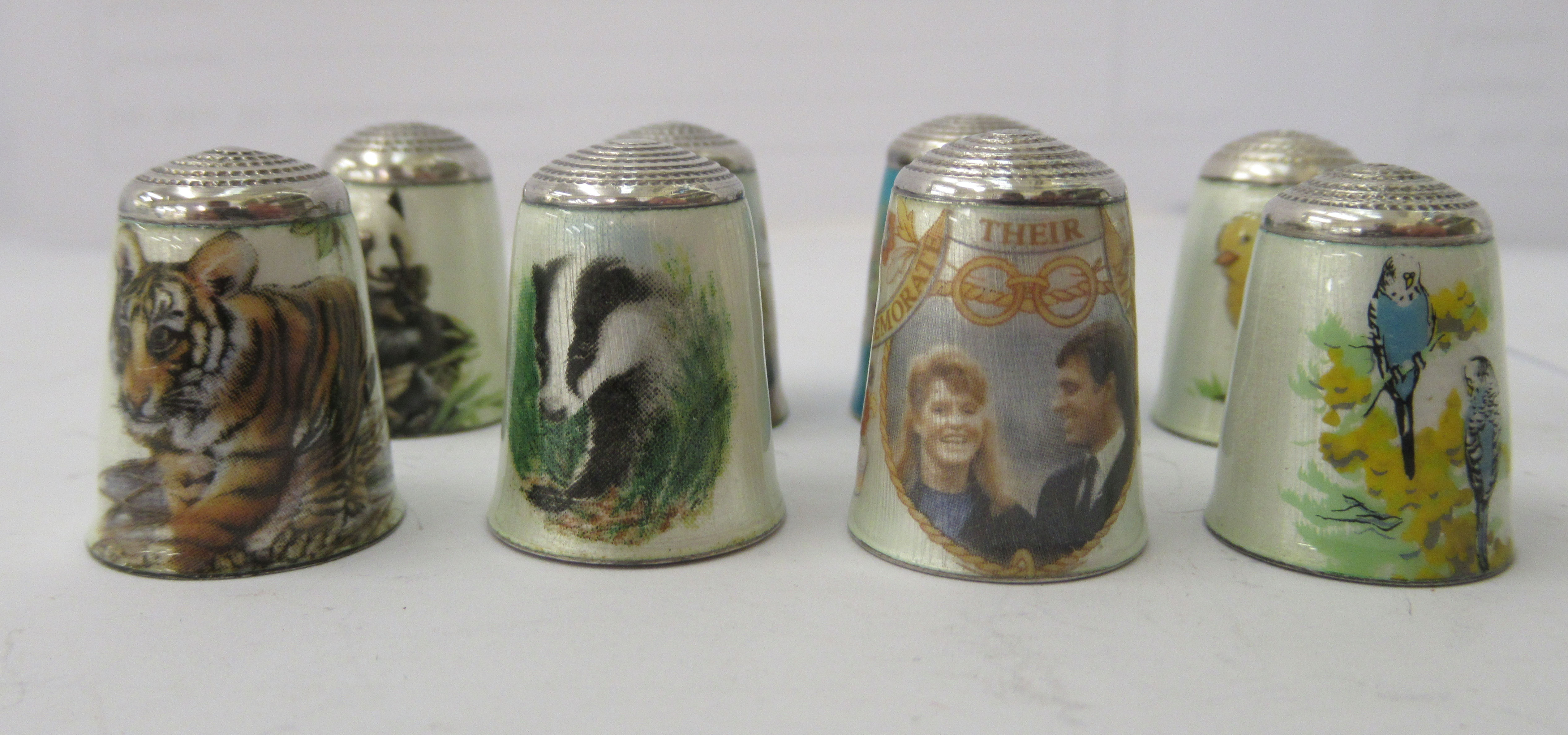 Eleven enamelled white metal thimbles, mostly decorated with wildlife - Image 2 of 3