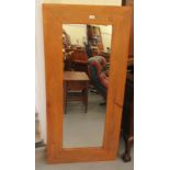 A modern fruitwood framed dressing mirror  57'' x 27''