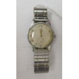 A 1950s/60s Tudor stainless steel cased bracelet watch, faced by an Arabic dial