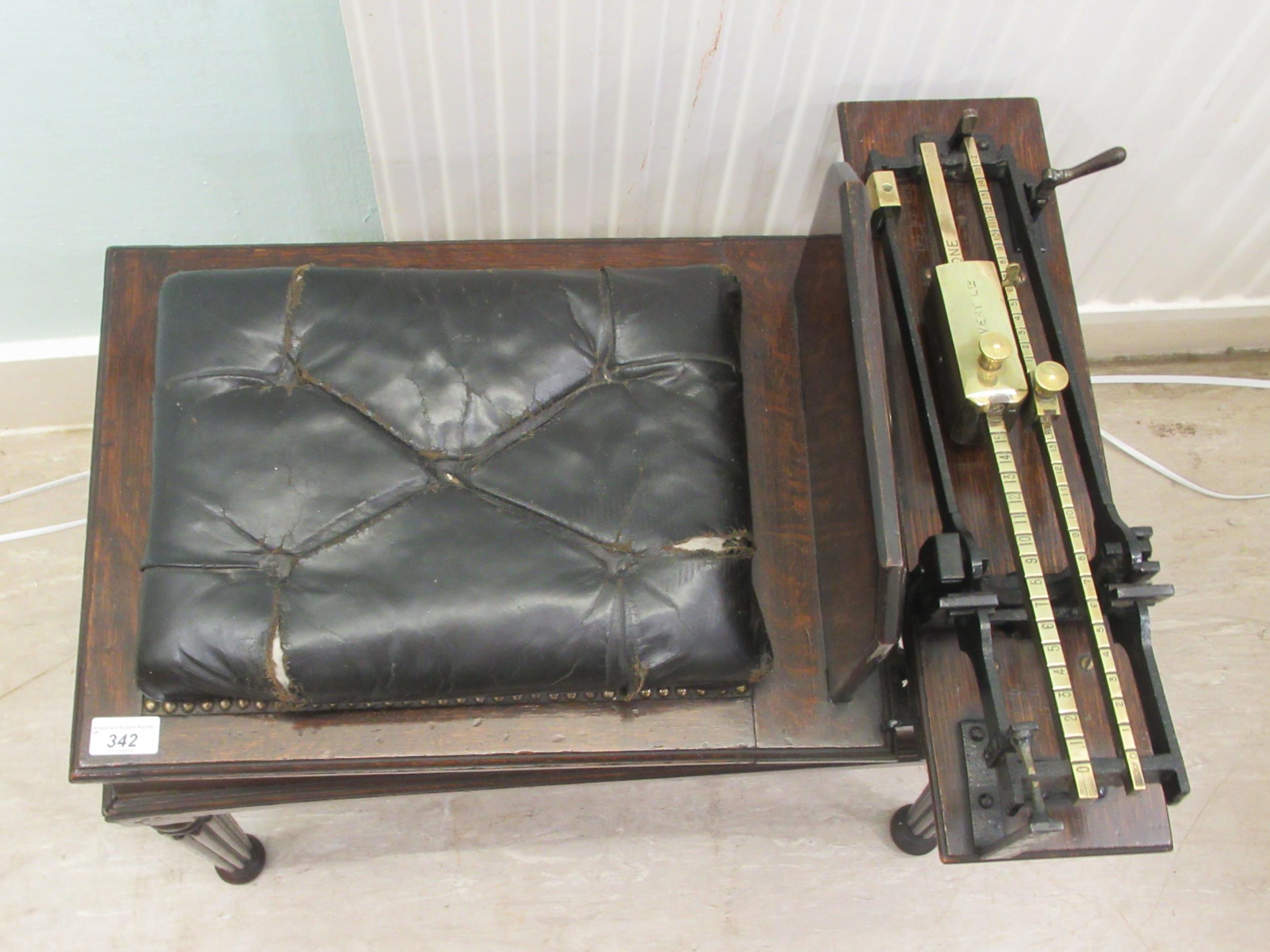 Early 20thC Avery jockey scales, the oak box top stool with a buttoned hide and stud upholstered - Image 2 of 9