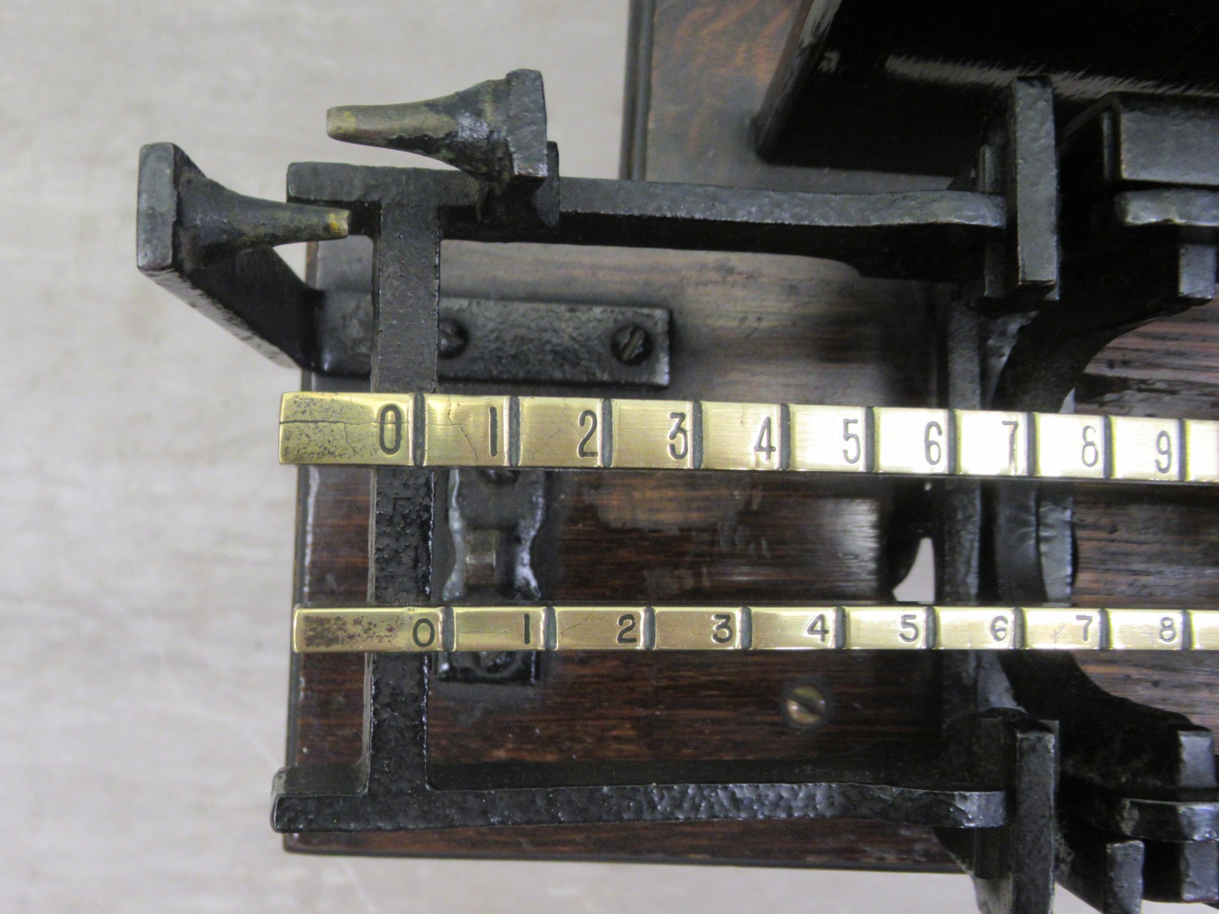 Early 20thC Avery jockey scales, the oak box top stool with a buttoned hide and stud upholstered - Image 9 of 9