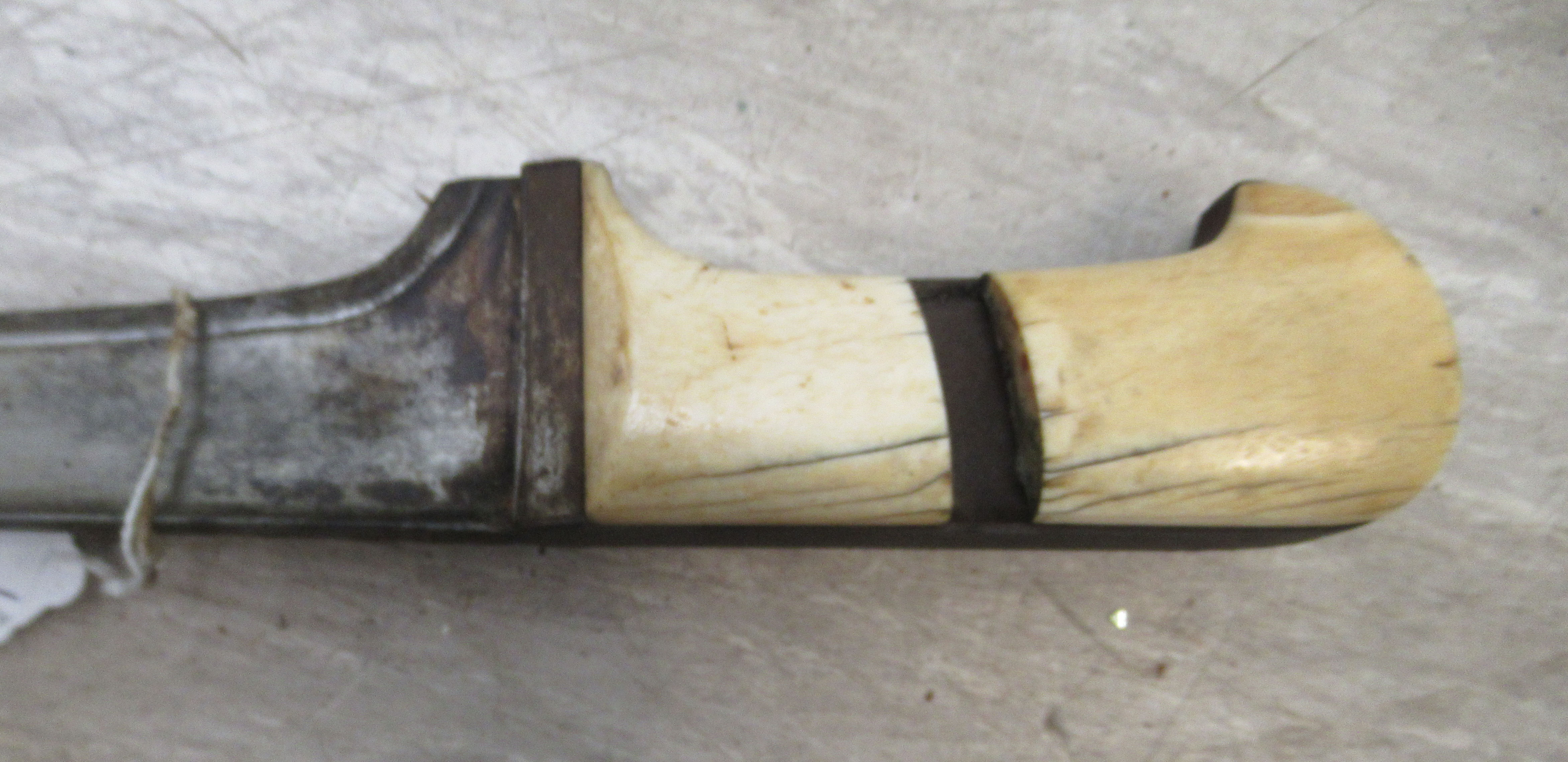 A late 19thC Indo-Persian Pesh-Kabz dagger, on an ivory clad handle  the blade 12"L in a hide - Image 3 of 8