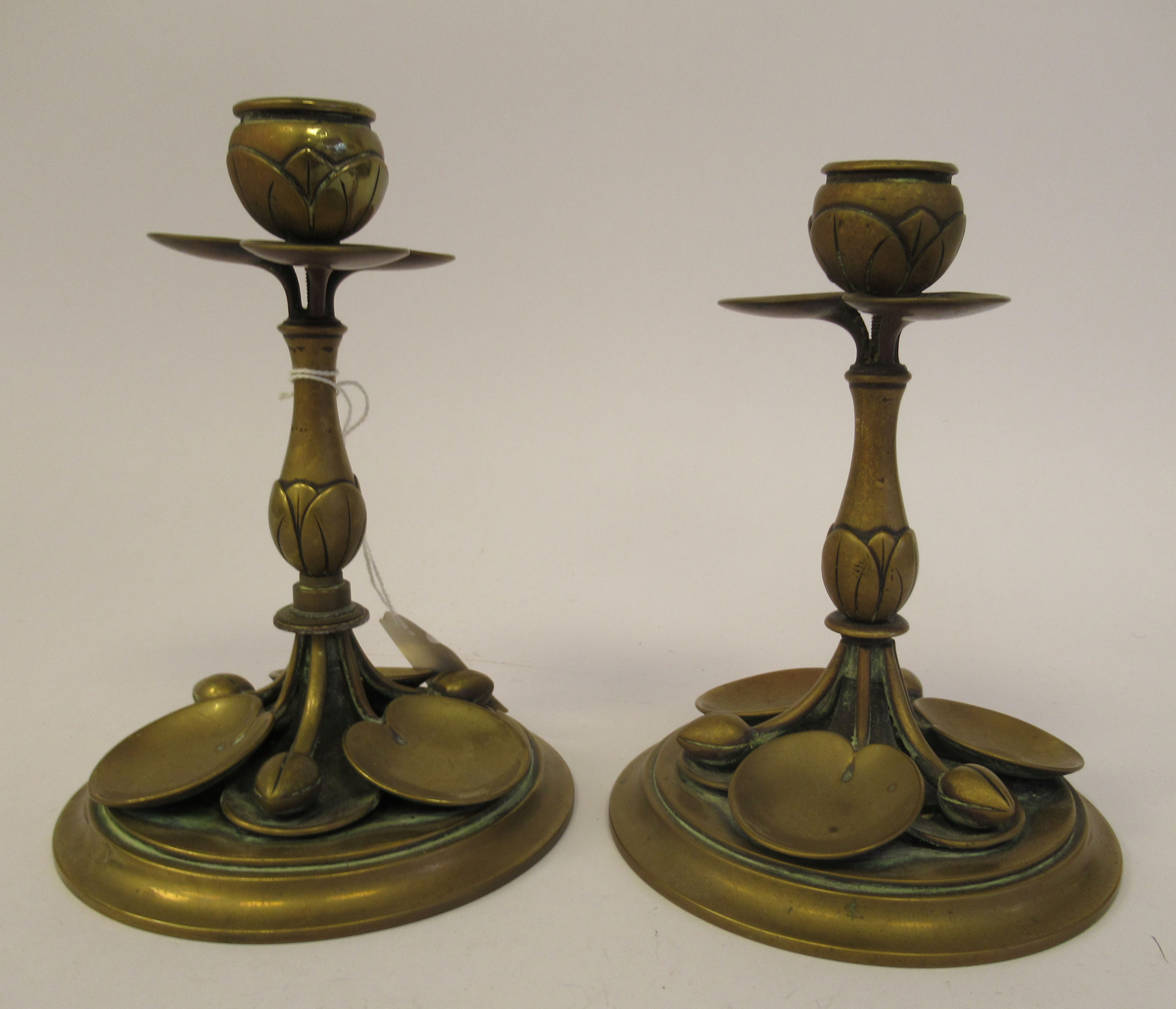 A matched pair of early 20thC Art Nouveau brass candlesticks, naturalistically cast with stylised - Image 2 of 6