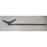 A late 19thC African Tribal axe on a bamboo handle  43"L overall