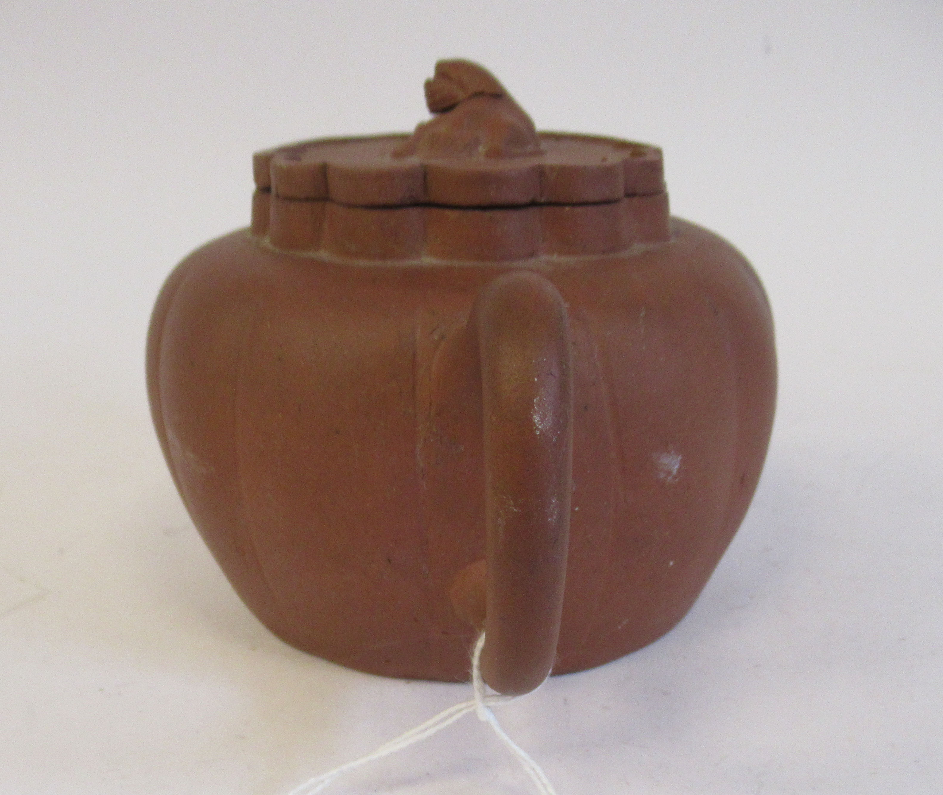 A mid 19thC Chinese Yixing terracotta teapot of segmented, squat, bulbous form with a kylin on the - Image 3 of 7
