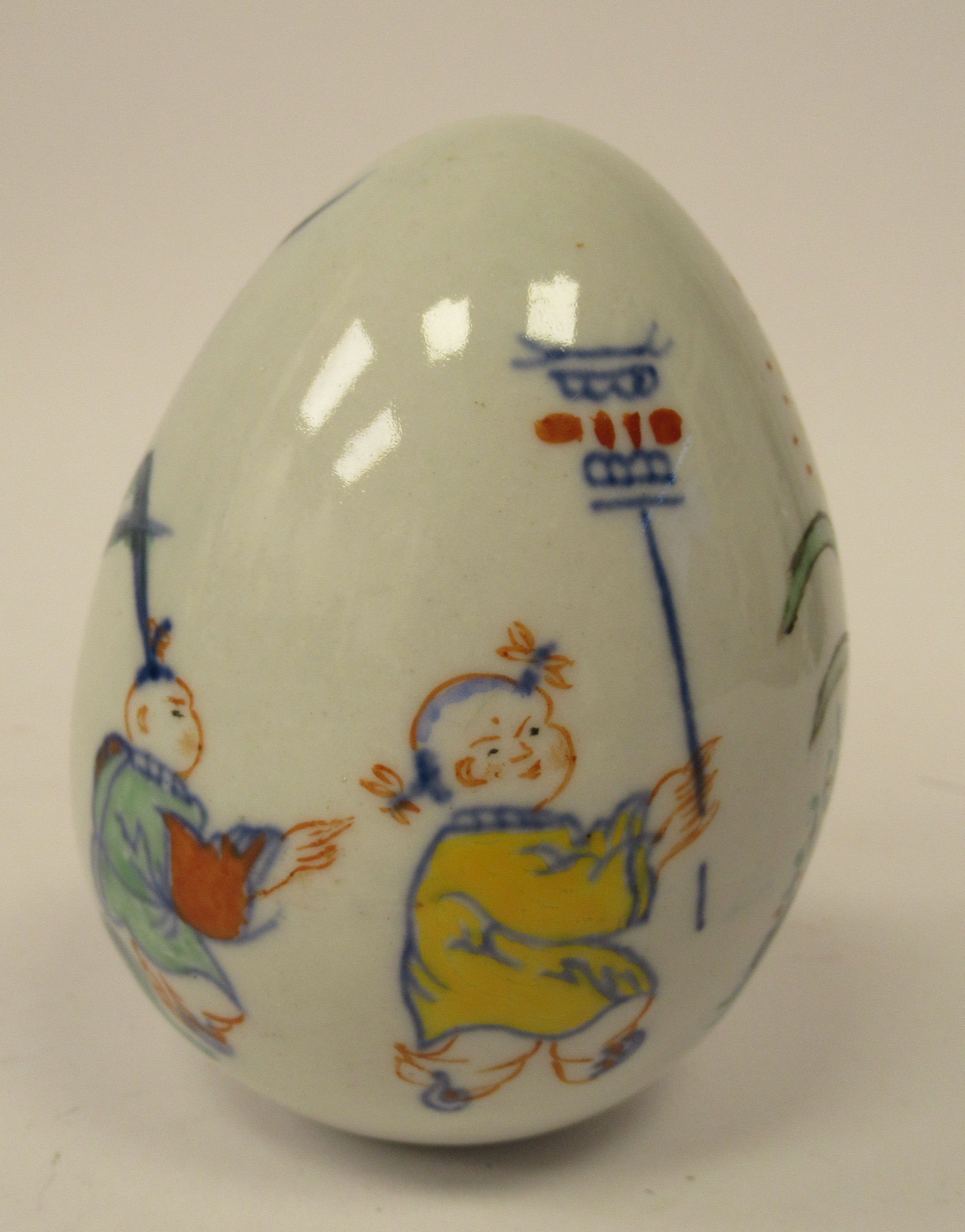 A 20thC Chinese porcelain egg shaped ornament, decorated in Doucai palette with boys at play  4''h - Image 3 of 6