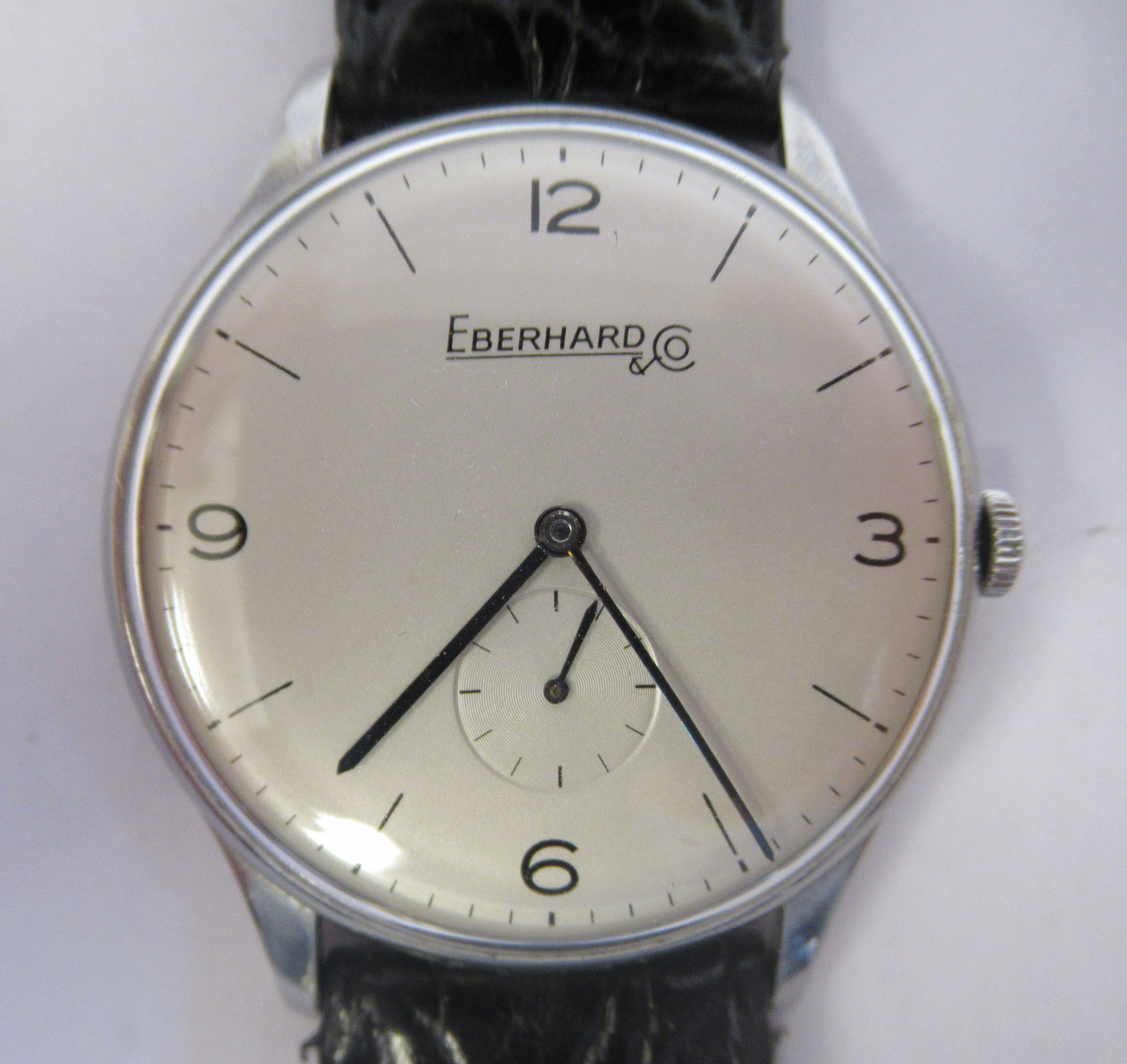 A 1940s Eberhard stainless steel cased wristwatch, faced by an Arabic and baton dial,