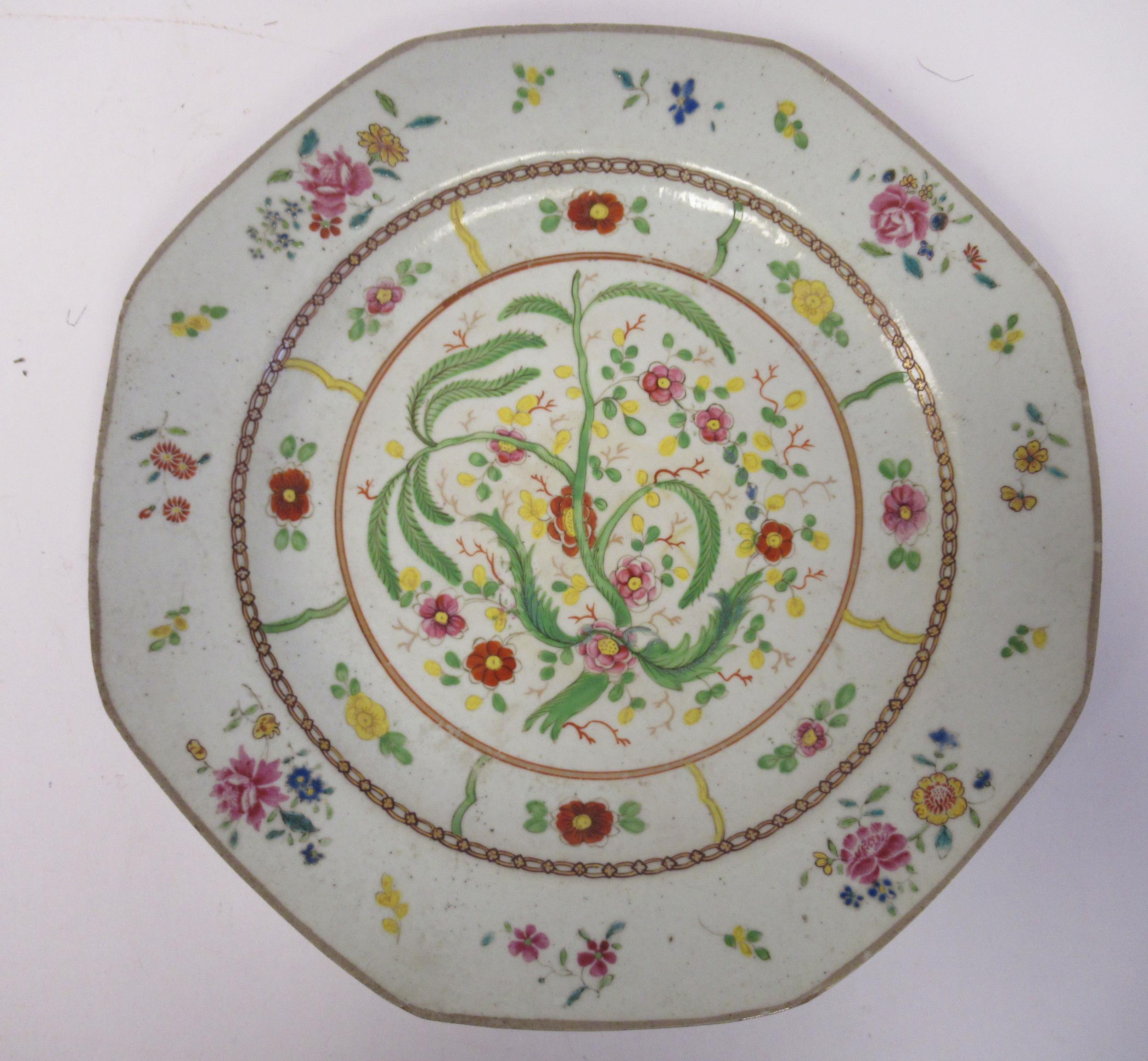 A mid 18thC Chinese porcelain octagonal dish, decorated in famille rose with an unusual floral field