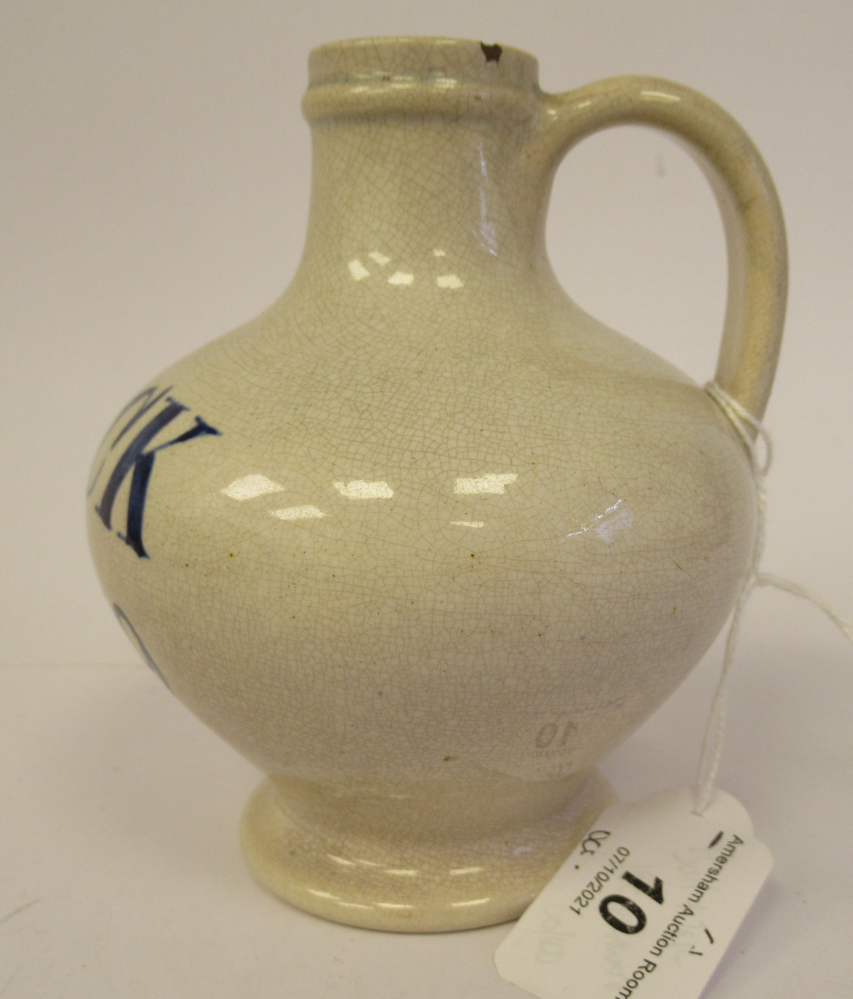 An early 19thC cream coloured Pearlware wine bottle of squat, bulbous form with a narrow neck and - Image 4 of 6