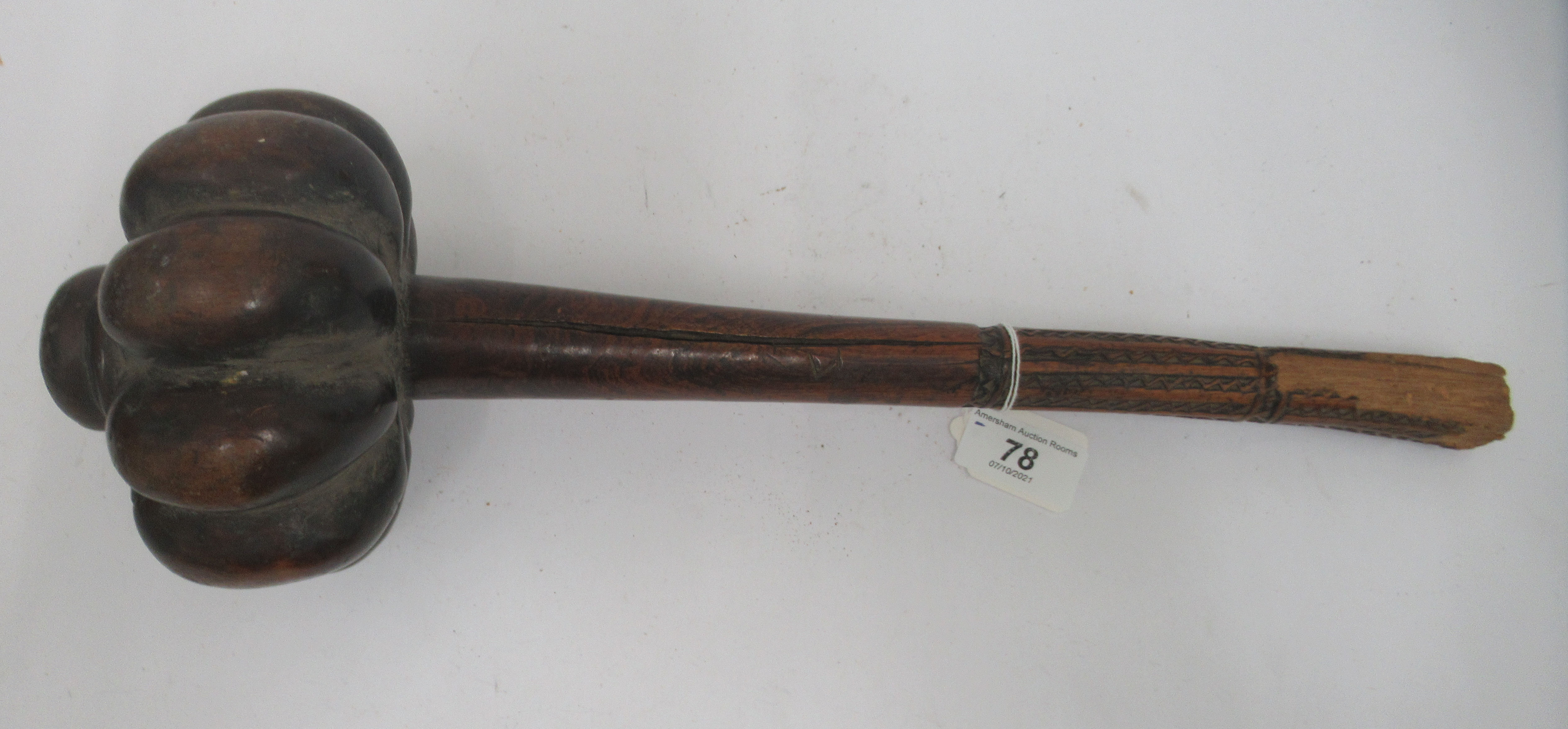 A late 19thC Fijian hardwood Iula Tavatava throwing club, the handle carved with geometric