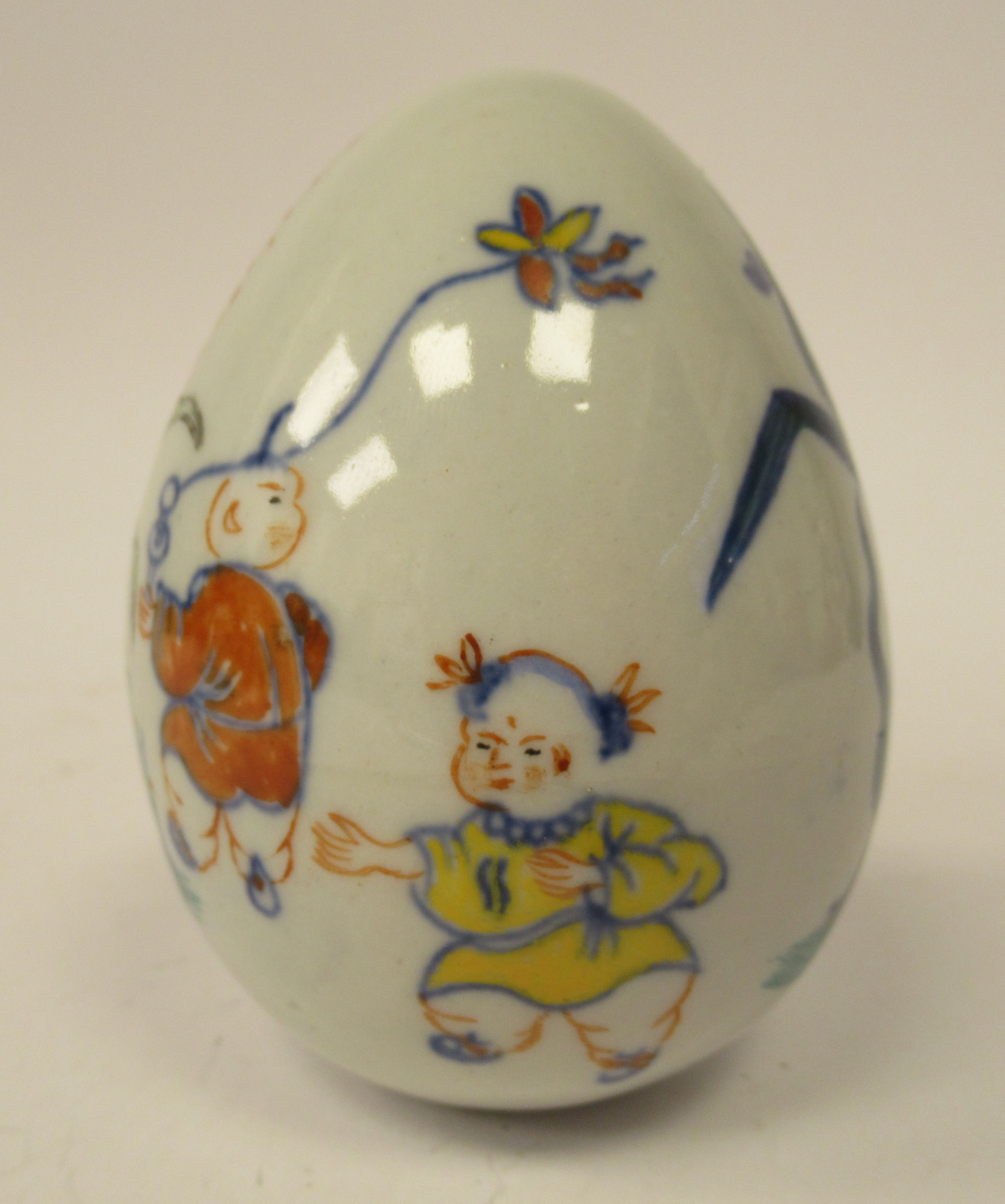 A 20thC Chinese porcelain egg shaped ornament, decorated in Doucai palette with boys at play  4''h - Image 4 of 6