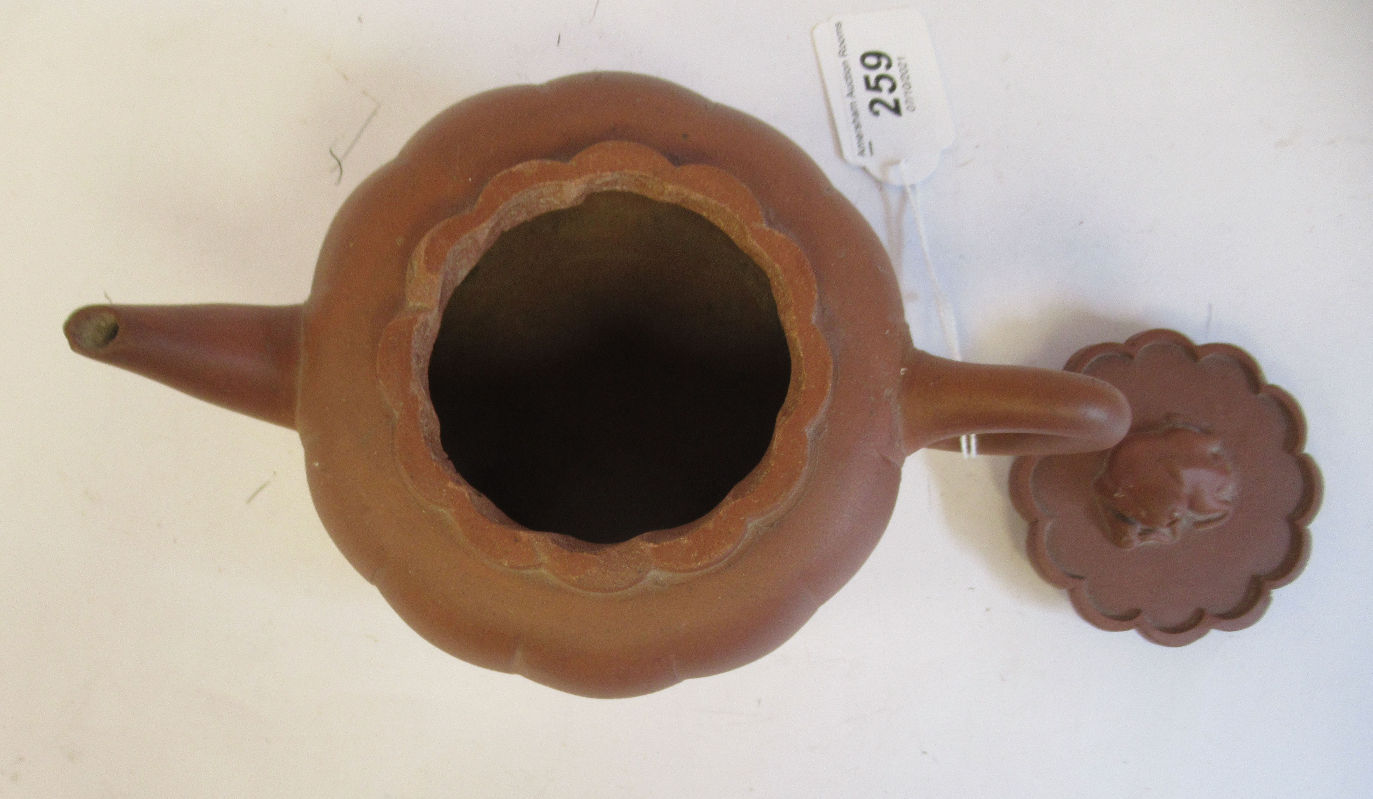 A mid 19thC Chinese Yixing terracotta teapot of segmented, squat, bulbous form with a kylin on the - Image 5 of 7