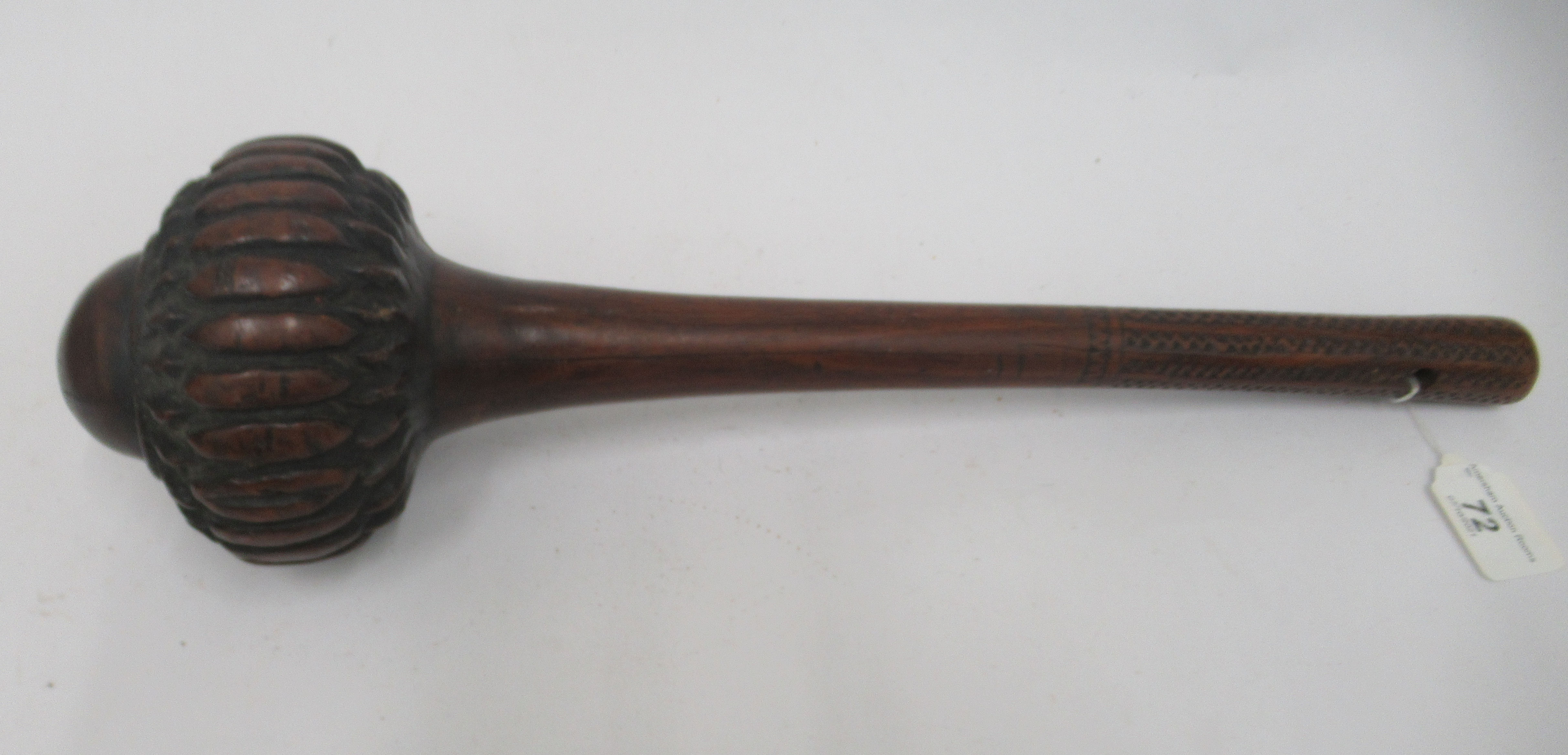 A late 19thC Fijian hardwood Iula Tavatava throwing club, the handle carved with geometric patterns