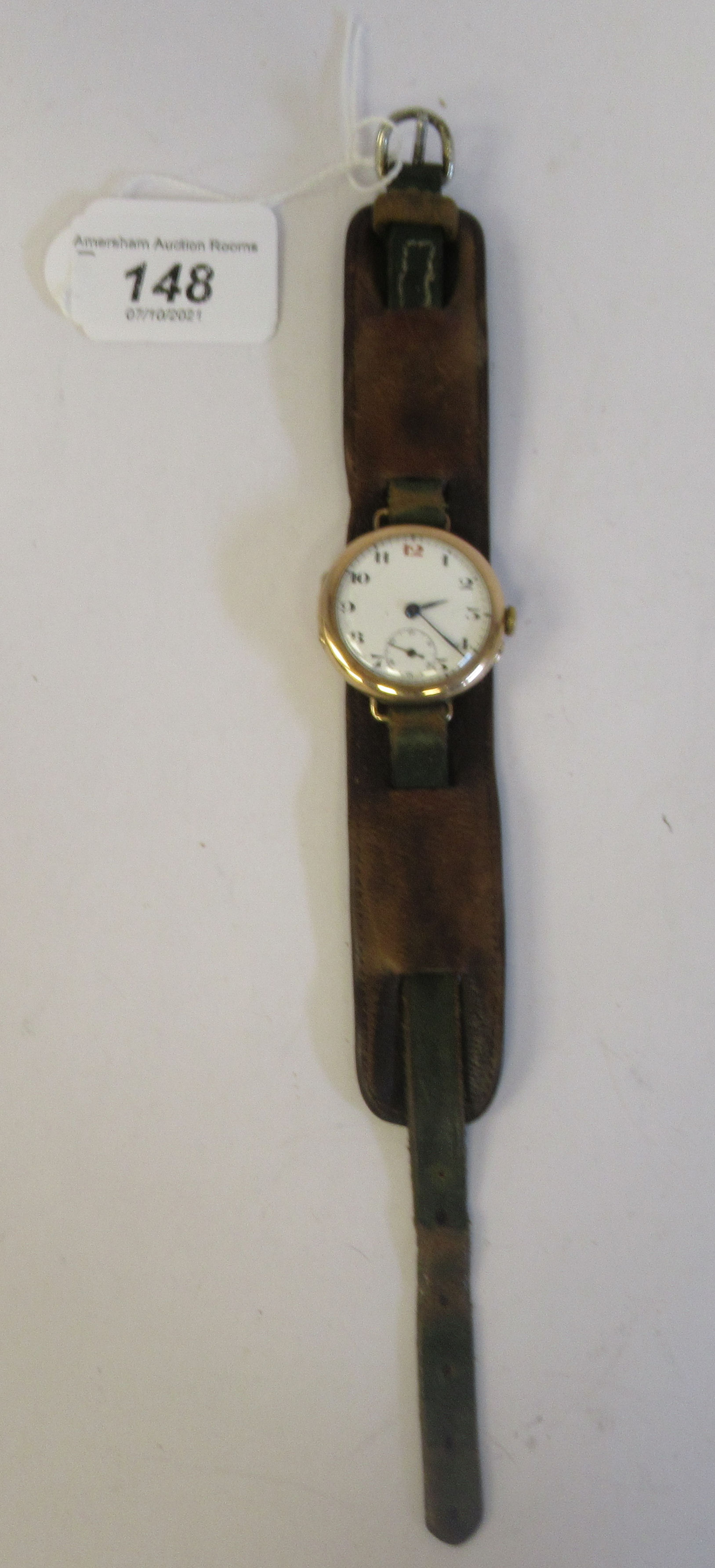 An early 20thC French officer's 9ct gold cased watch, faced by a white enamel Arabic dial, - Image 2 of 3