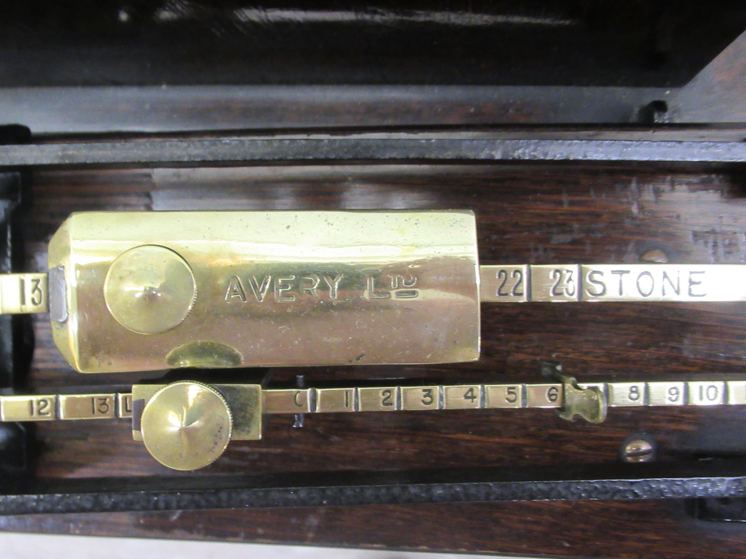 Early 20thC Avery jockey scales, the oak box top stool with a buttoned hide and stud upholstered - Image 7 of 9