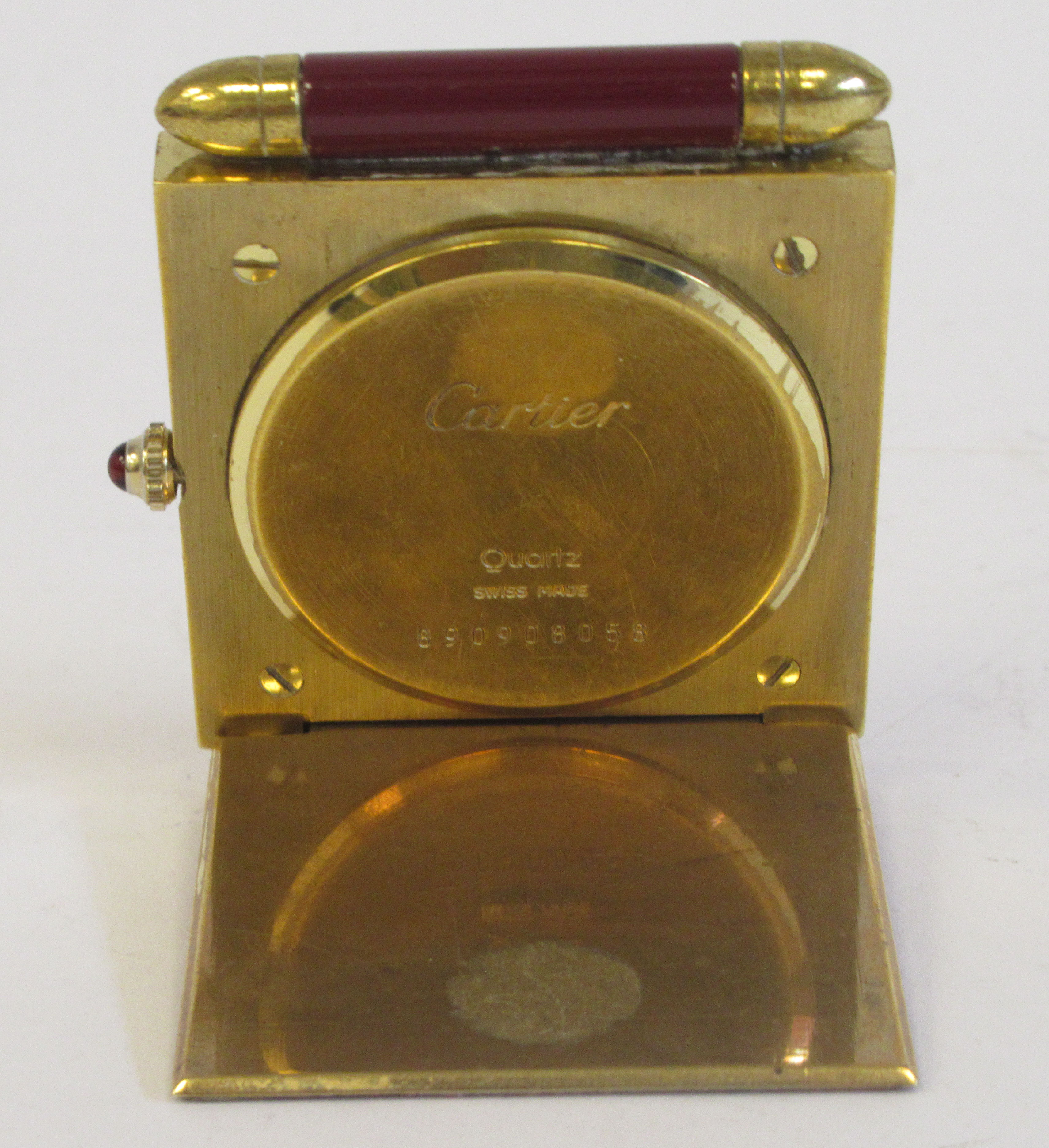 A Cartier Swiss made traveller's lacquered gilt metal cased timepiece of slim, square form with a - Image 3 of 6