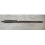 A late 19thC Aboriginal digging stick, the grip with carved textured decoration  28"L