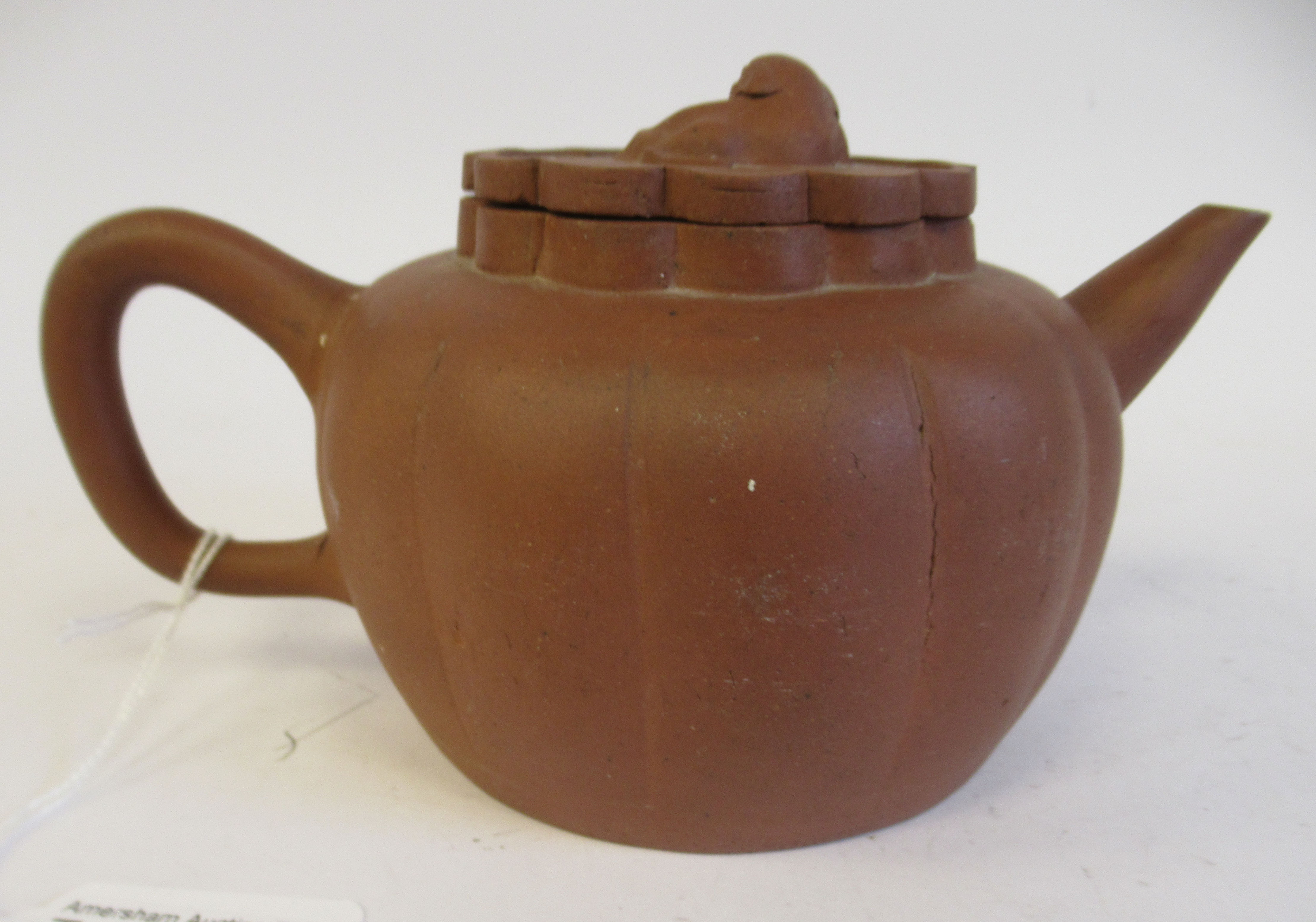 A mid 19thC Chinese Yixing terracotta teapot of segmented, squat, bulbous form with a kylin on the - Image 2 of 7