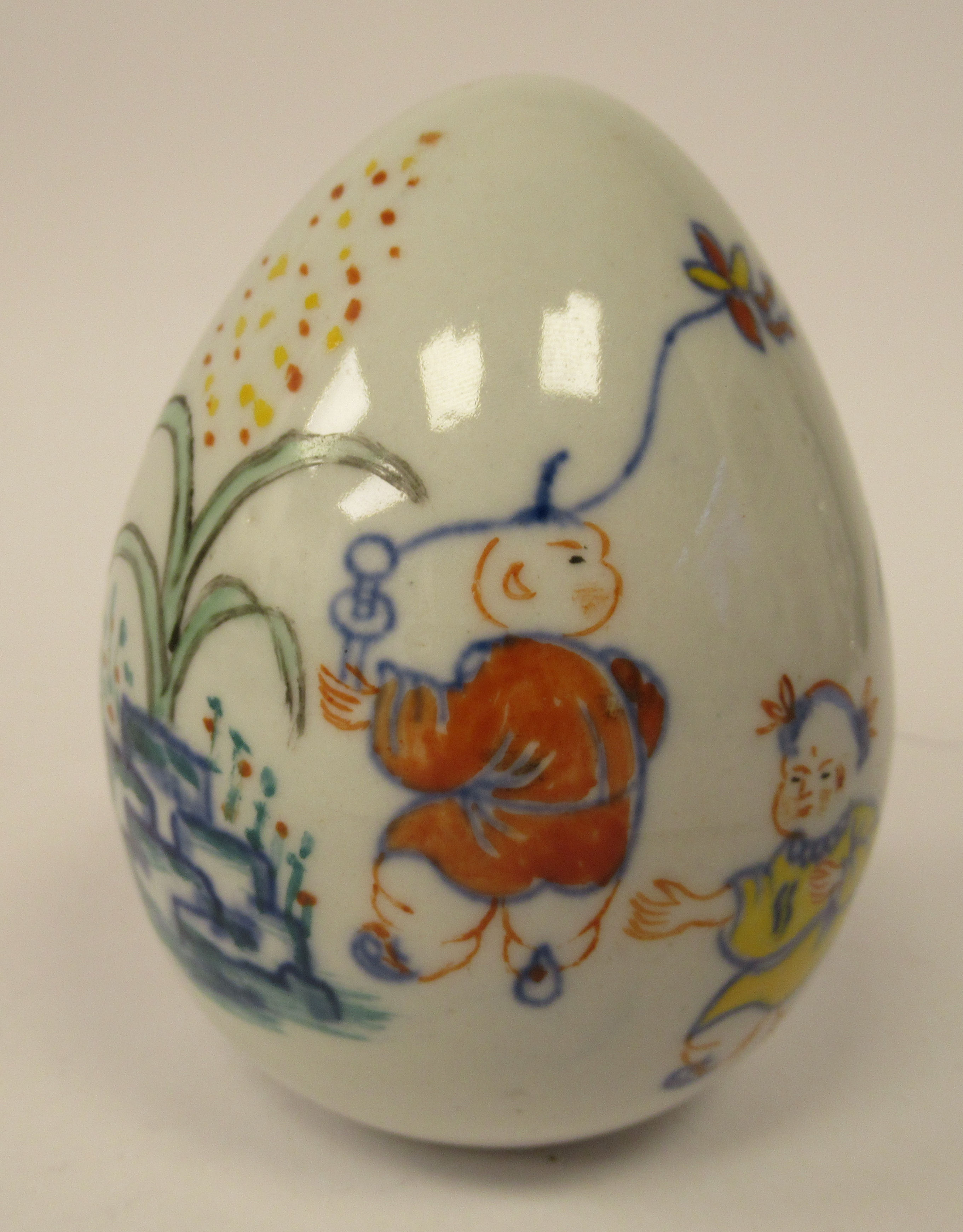 A 20thC Chinese porcelain egg shaped ornament, decorated in Doucai palette with boys at play  4''h - Image 2 of 6