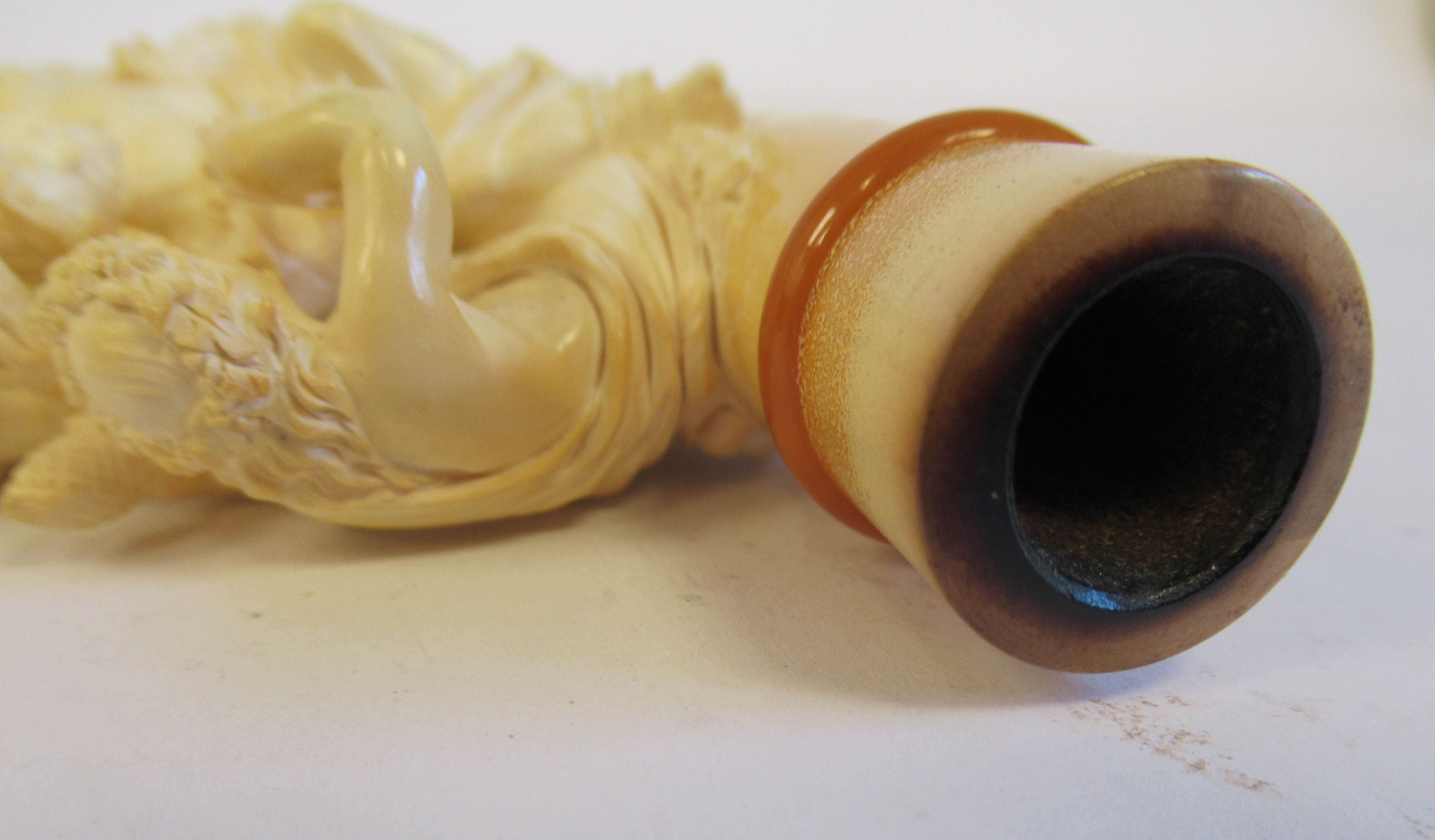 A late 19thC meerschaum and amber smoker's pipe/cheroot holder, finely carved with an allegorical - Image 7 of 8