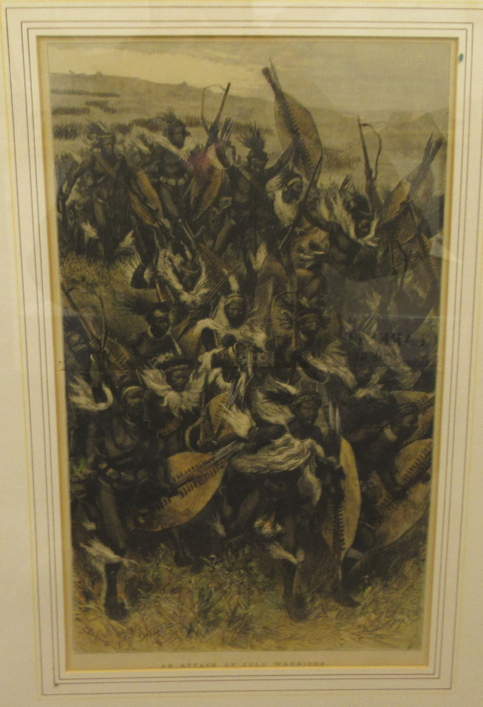 After G Durany - an attack of Zulu Warriors  tinted engraving  20'' x 12''  framed