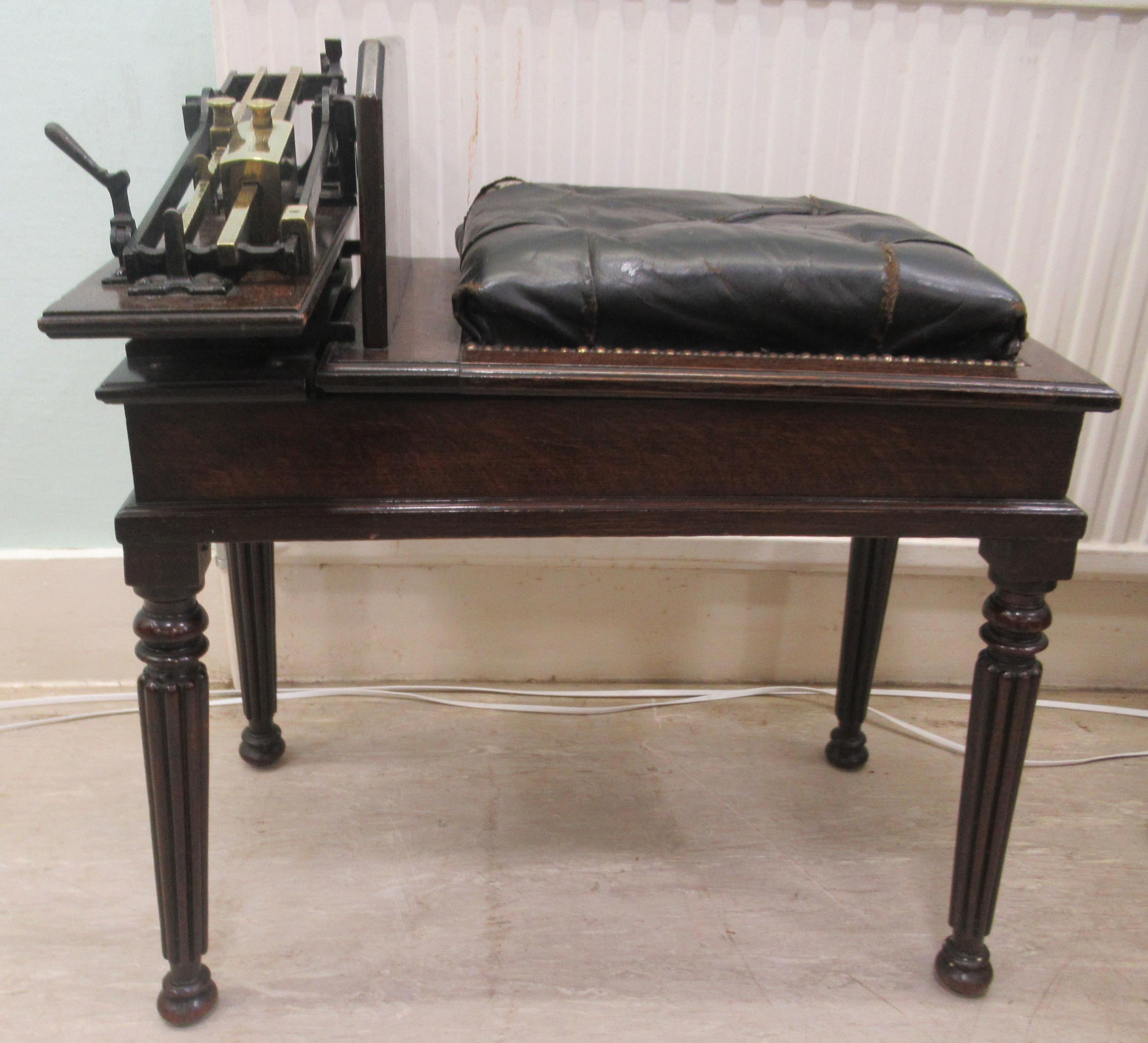 Early 20thC Avery jockey scales, the oak box top stool with a buttoned hide and stud upholstered - Image 4 of 9