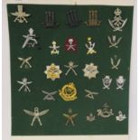Approx. twenty-five Gurkha regiment cap badges and other uniform insignia, some copies  (Please