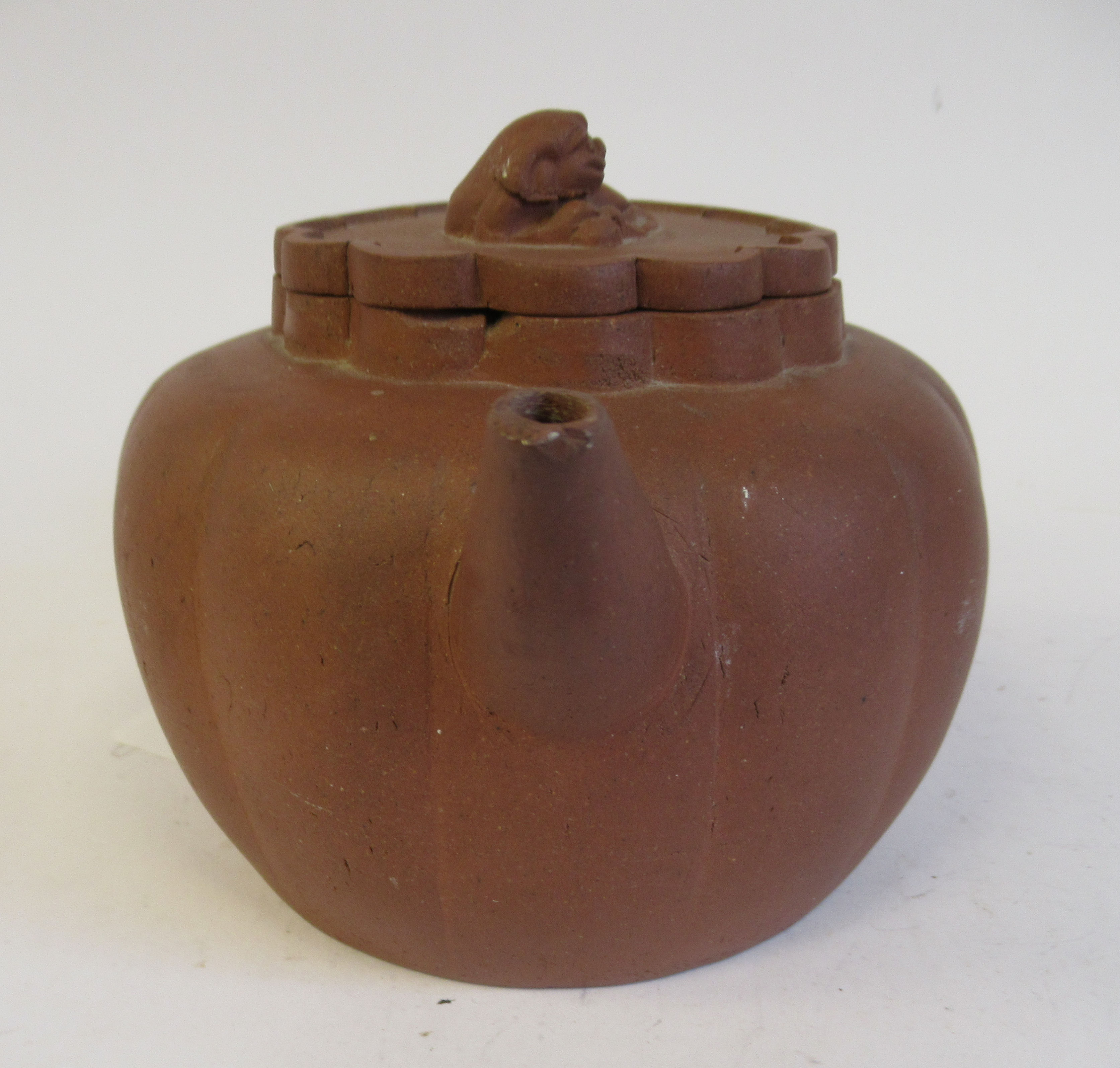 A mid 19thC Chinese Yixing terracotta teapot of segmented, squat, bulbous form with a kylin on the - Image 4 of 7