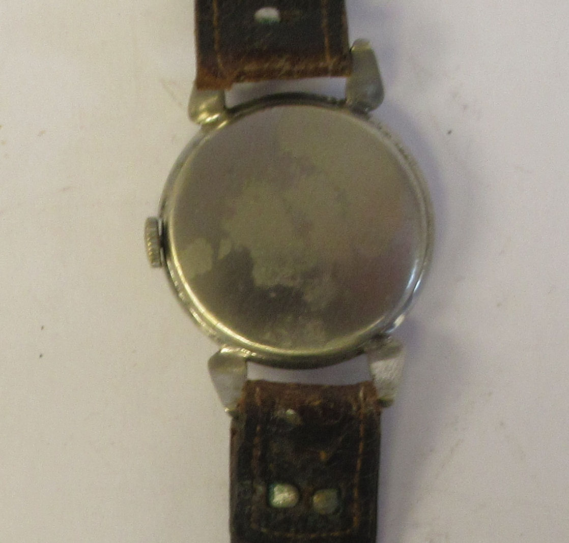 A 1933 Omega chromium plated crab cased wristwatch, faced by a black Arabic dial, incorporating - Image 4 of 4