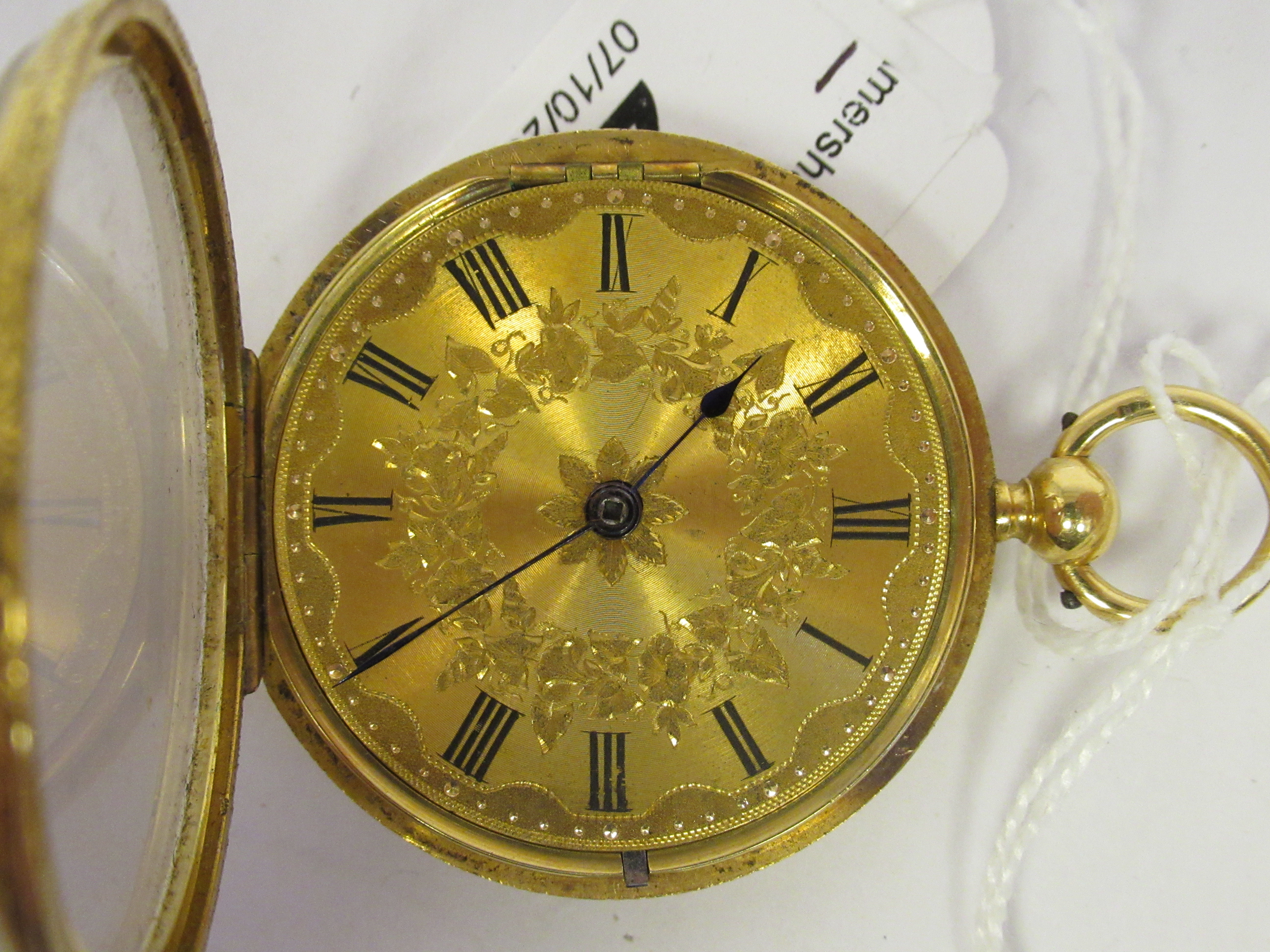 A lady's 18ct gold cased pocket watch with engraved decoration, faced by a finely engine turned - Image 3 of 3