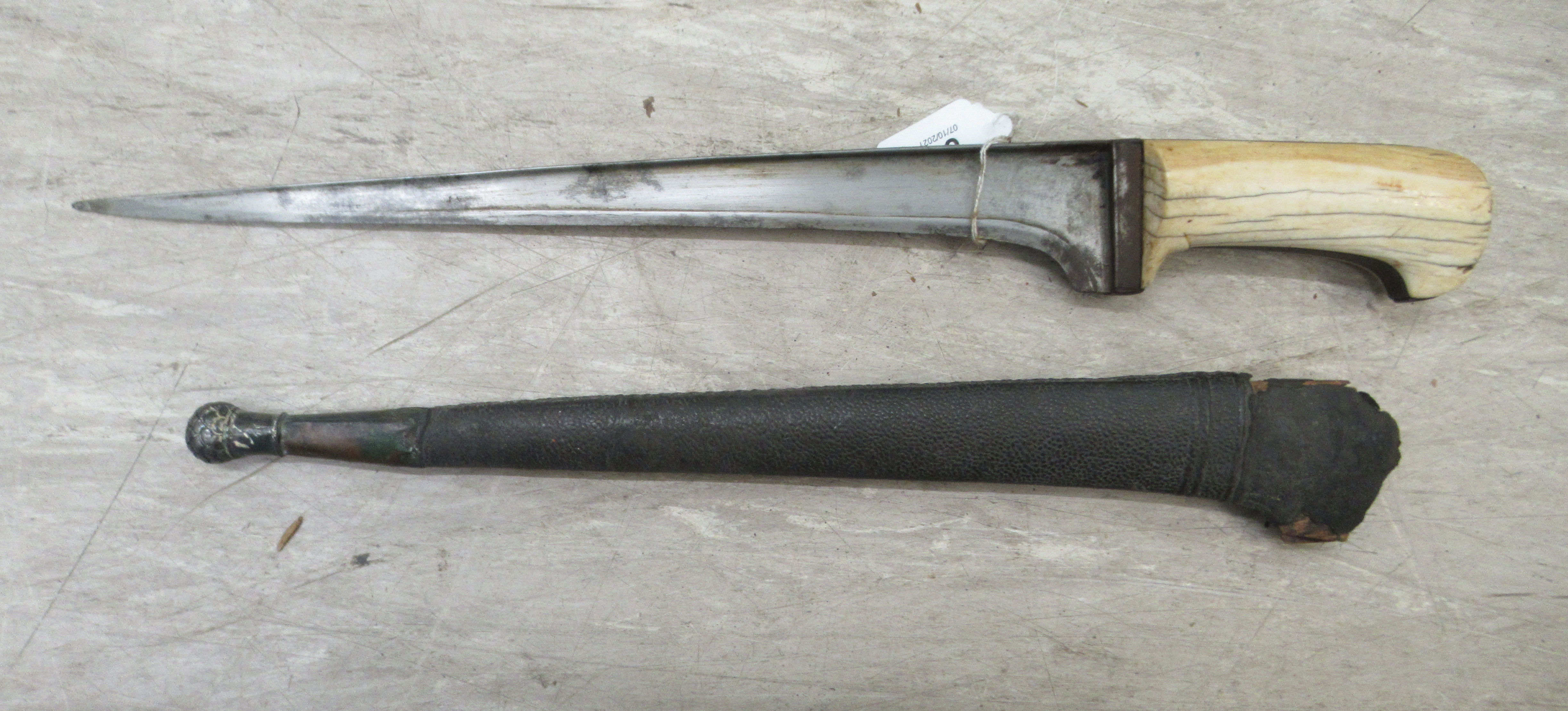 A late 19thC Indo-Persian Pesh-Kabz dagger, on an ivory clad handle  the blade 12"L in a hide - Image 2 of 8