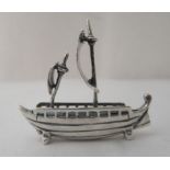 A miniature silver model, a longboat under sail