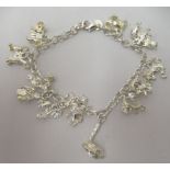 A silver coloured metal charm bracelet