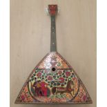 A modern Balalaika with overpainted and gilded decoration