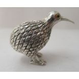 A miniature sterling silver model, a standing Kiwi  bears an impressed mark