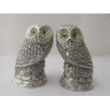 A pair of silver plated novelty condiments pots, fashioned as perched owls