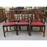 A set of six early 20thC Chippendale design mahogany showwood framed, pierced splat back chairs, the