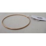 An 18ct gold, plain, thin bangle