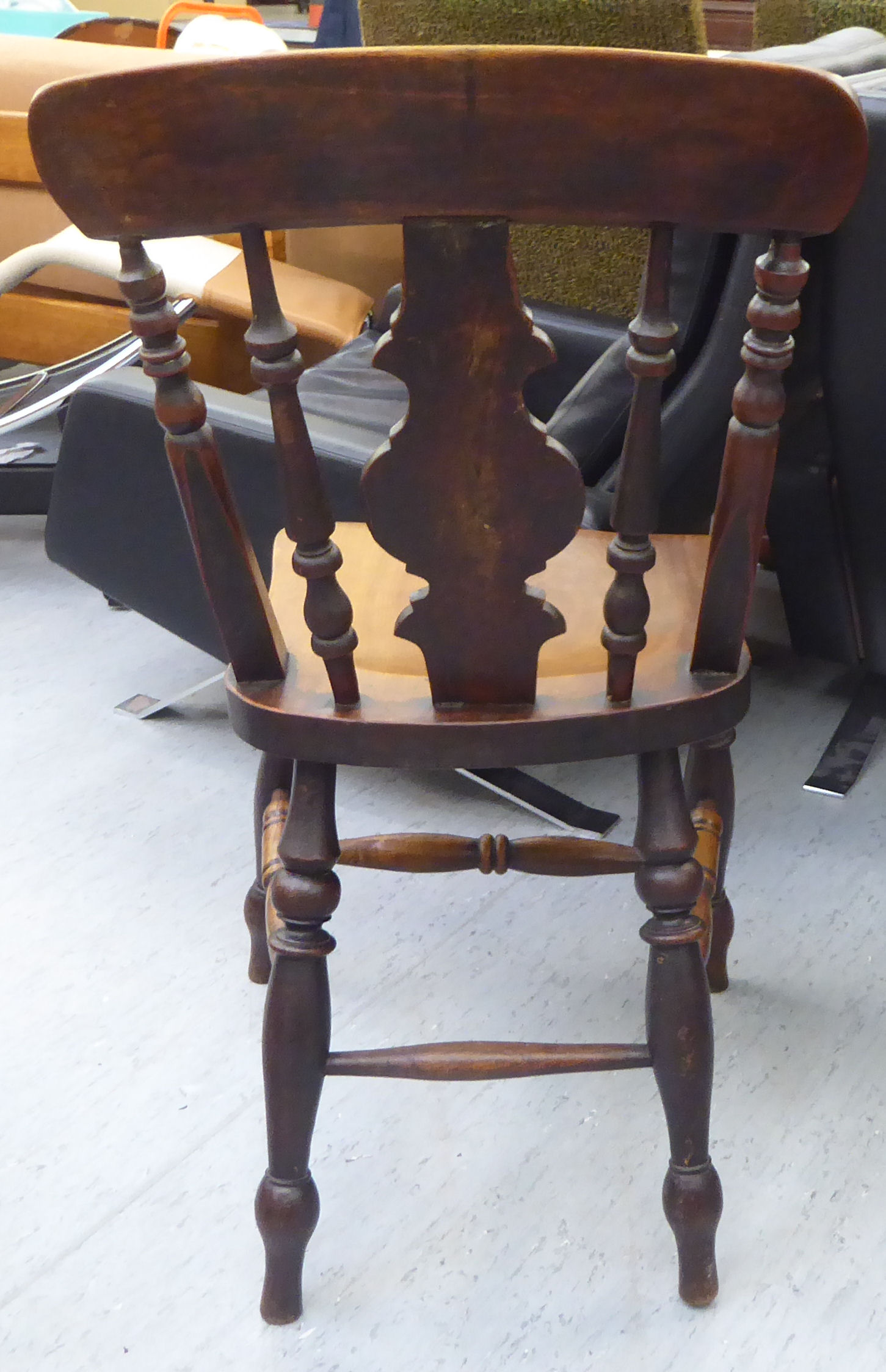 A set of four late Victorian beech and elm framed Windsor chairs, each with a spindled and roundel - Image 4 of 4