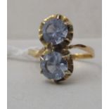 An 18ct gold claw set, double cubic zirconia ring