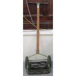 A mid 20thC push-along Folbate lawnmower with an 11.5" cut