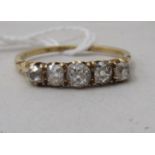 An 18ct gold claw set, five stone diamond ring