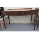 An Edwardian string and ebony inlaid mahogany bow front serving table with two inline drawers,