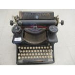 An early 20thC Woodstock manual typewriter with a 9.5" carriage