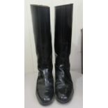 Two military uniforms; and a pair of size 10 black riding boots