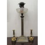 A late Victorian brass table lamp with a Corinthian column and cut glass reservoir  25"h; a pair